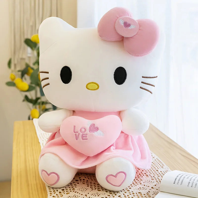 Beautiful Sanrio Hello Kitty Pink Plushies With Love Hearts. In Sizes 25cm, 30cm, 40cm & 55cm.