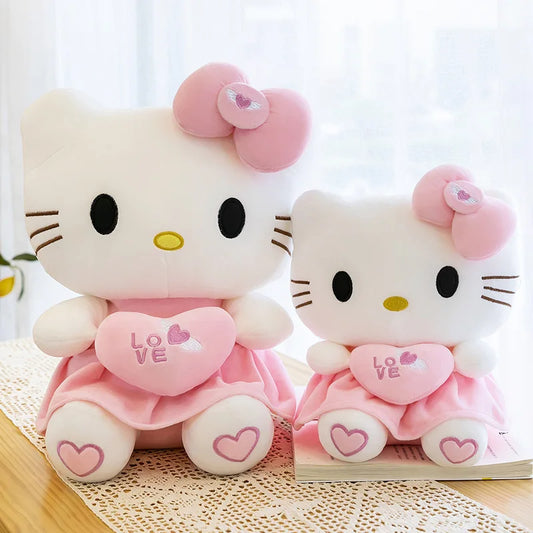 Beautiful Sanrio Hello Kitty Pink Plushies With Love Hearts. In Sizes 25cm, 30cm, 40cm & 55cm.